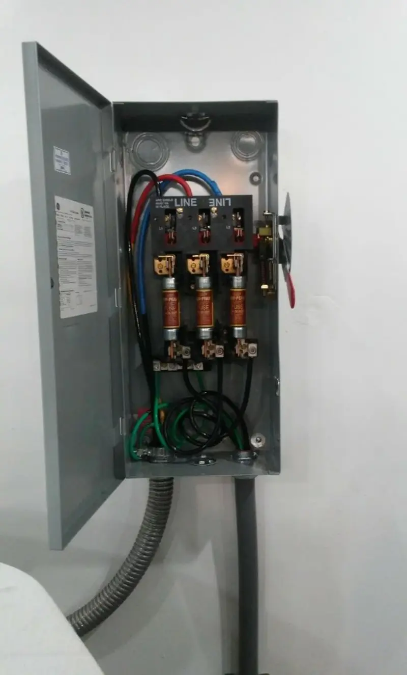 Three-phase disconnect switch installed for Smoke Detector Installation in Porter